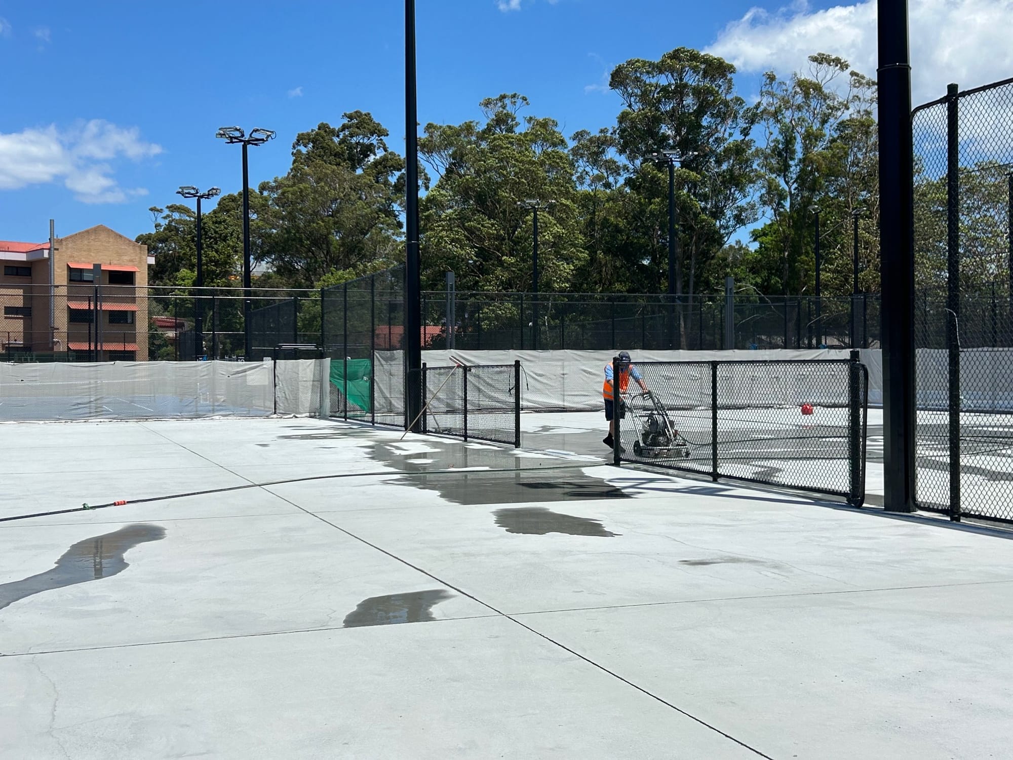 Asbestos, 'bubbling' courts and weather cause delays to new-look Beaton Park tennis centre 
												post image