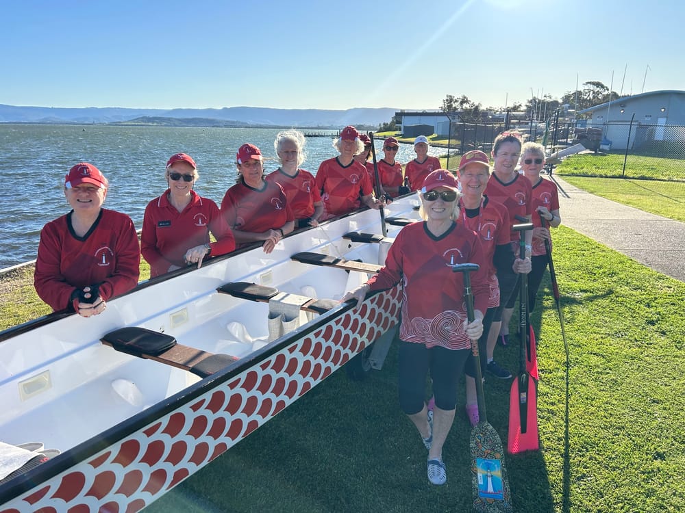 An open invitation to try dragon boating on the lake during Breast Cancer Awareness Month post image